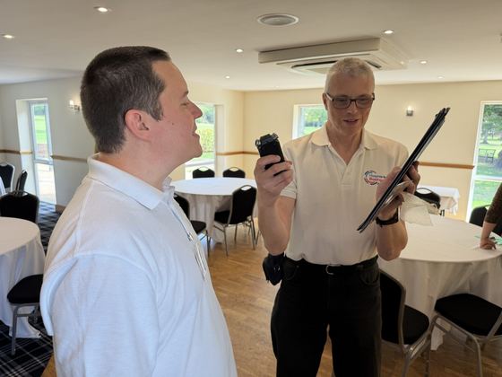 A Hospital Radio Basingstoke volunteer recording an interview with an organiser