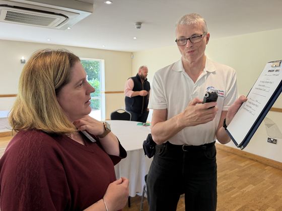 A Hospital Radio Basingstoke volunteer interviewing a member